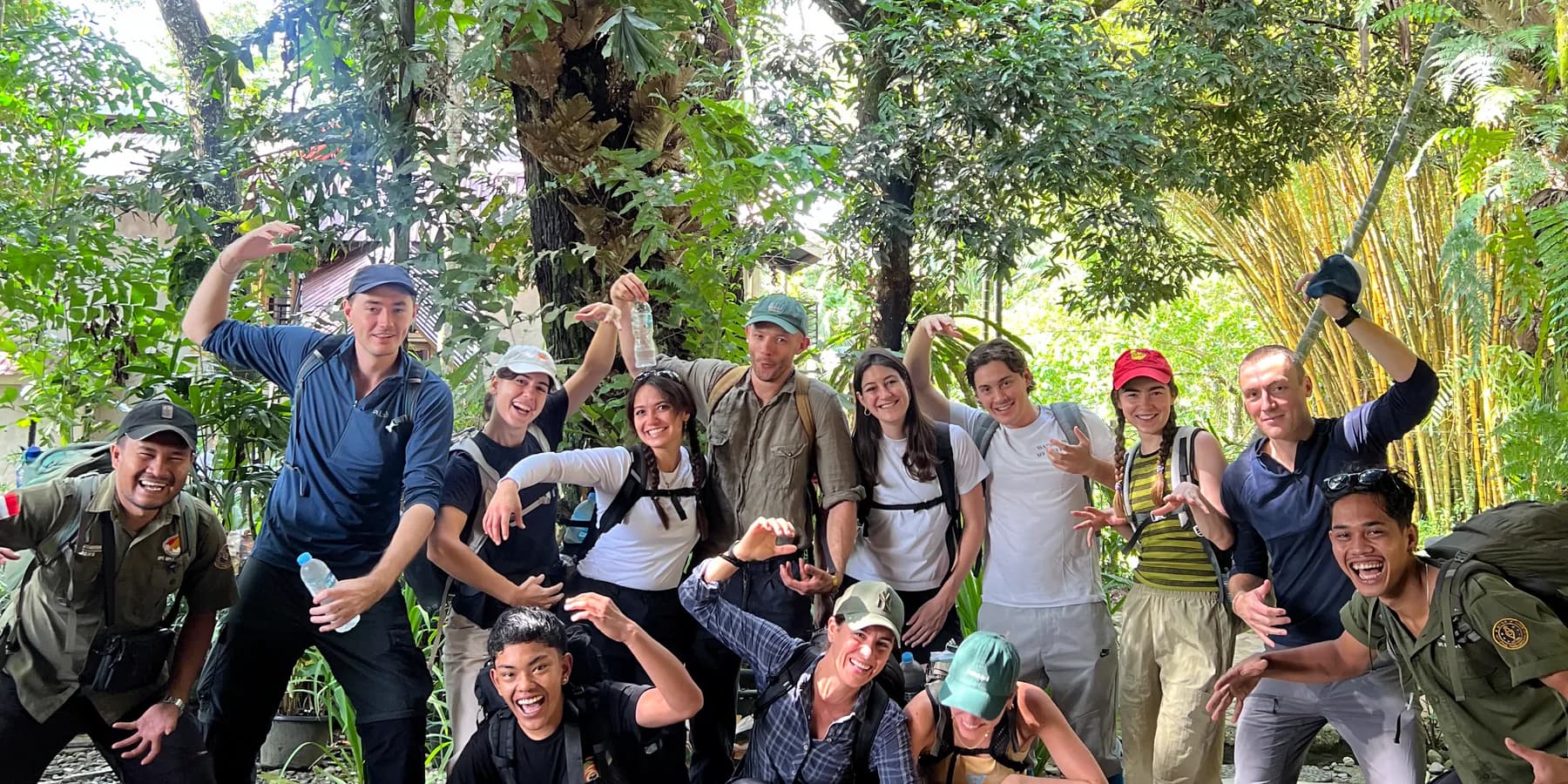 Guests sharing a joyful moment with the local trekking team